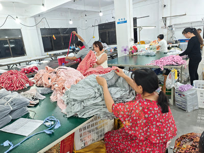 Skilled workers handling garment detail processing
